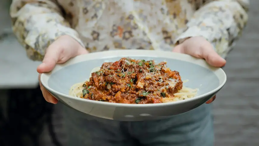 Delicious Pasta Bolognese in a white plate